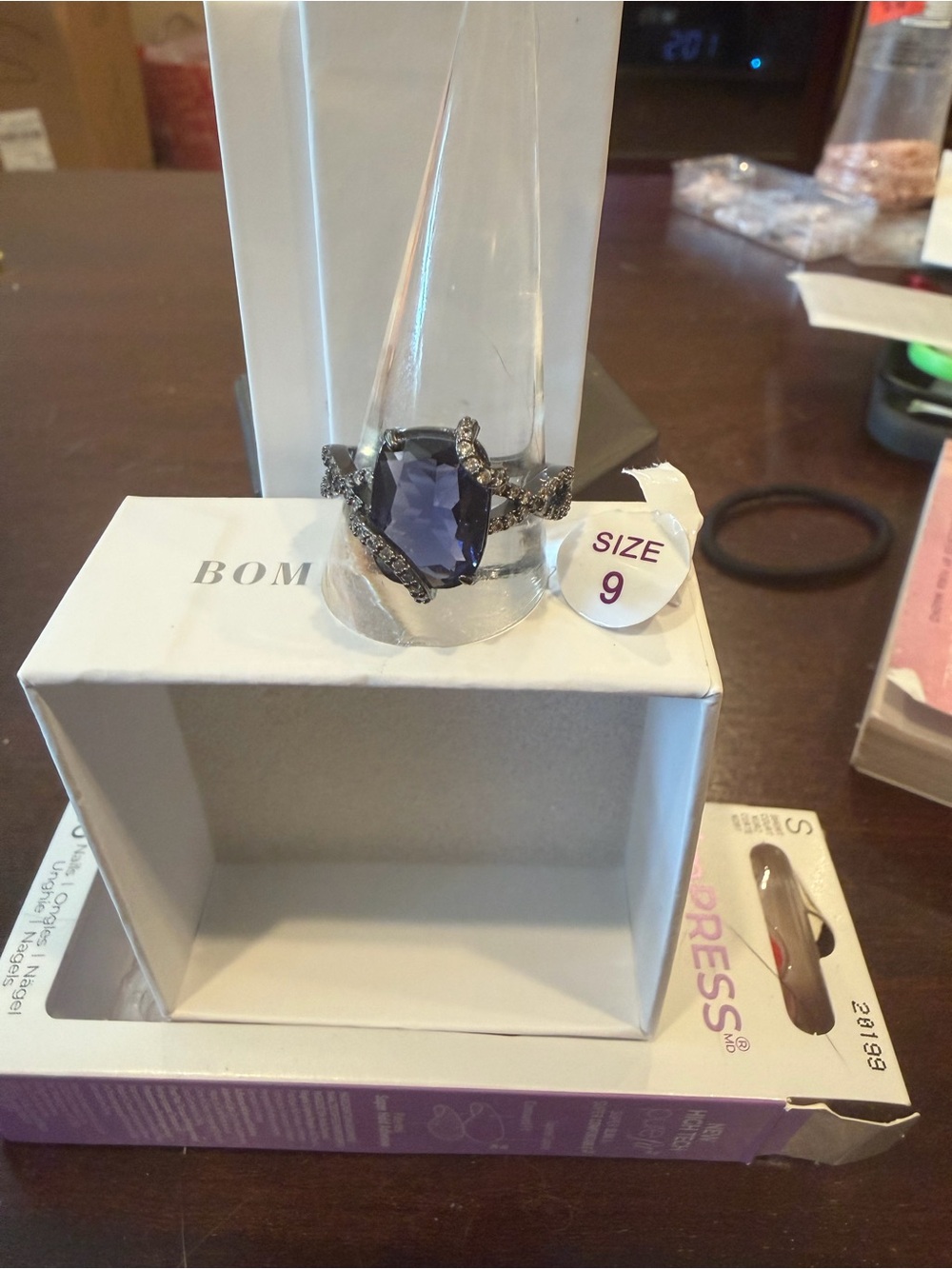 Sirens: Tanzanite on Hematite